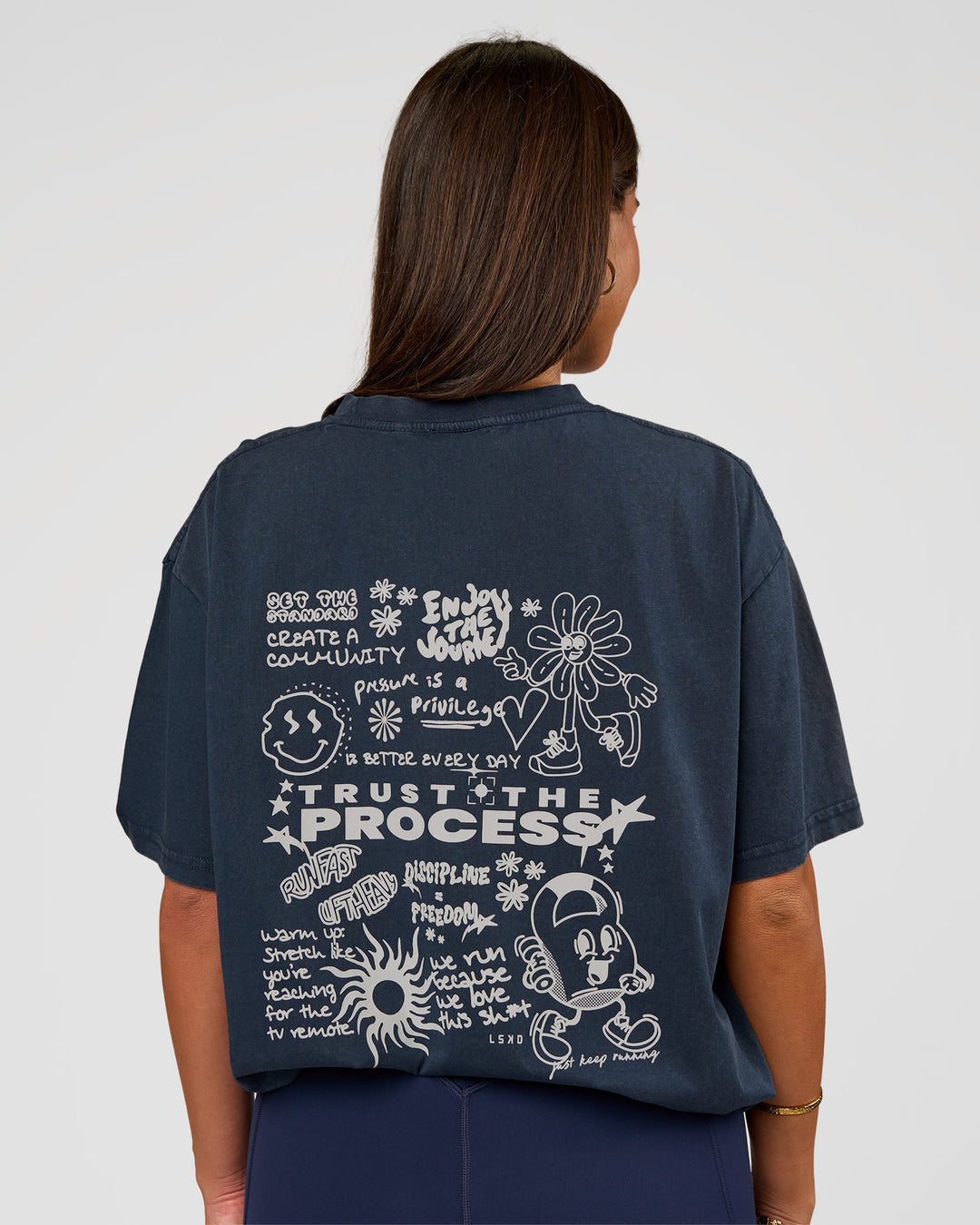 Woman wearing Built On Values Oversized Washed Tee - Future Navy Washed-White | Model:Bianca | Size:S