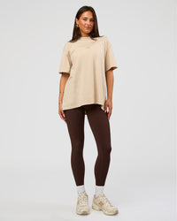 Woman wearing Built On Values Oversized Washed Tee - Shale Beige Washed-Hot Chocolate | Model:Bianca | Size:S