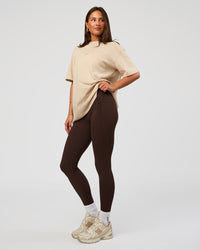 Woman wearing Built On Values Oversized Washed Tee - Shale Beige Washed-Hot Chocolate | Model:Bianca | Size:S