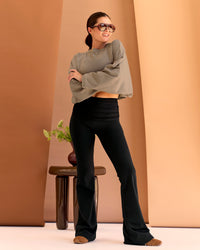 Woman wearing CF Fold Over High-Rise Flared Legging - Black | Model:Chloe | Size:S