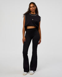 Woman wearing CF Fold Over High-Rise Flared Legging - Black | Model:Jordan | Size:S