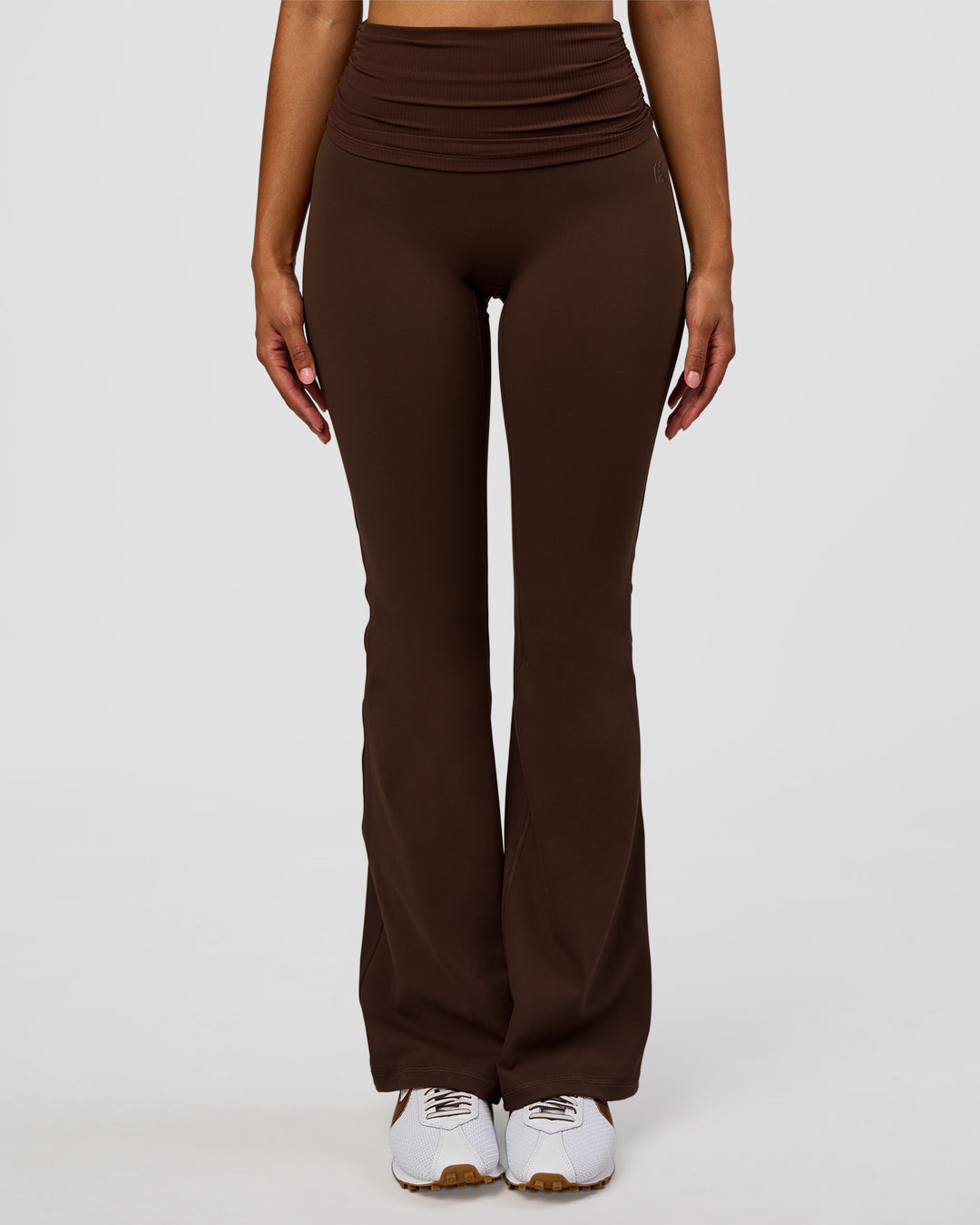 Model wearing CF Fold Over High-Rise Flared Legging - Hot Chocolate | Model:Jordan | Size:S