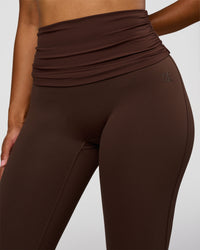 Model wearing CF Fold Over High-Rise Flared Legging - Hot Chocolate | Model:Jordan | Size:S
