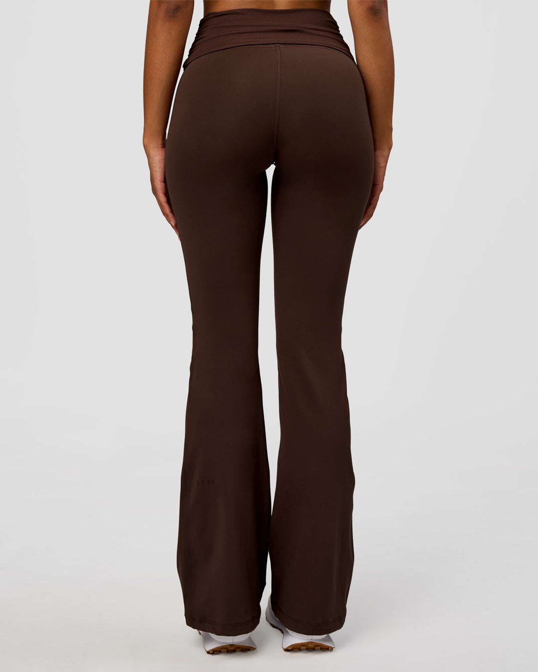Model wearing CF Fold Over High-Rise Flared Legging - Hot Chocolate | Model:Jordan | Size:S