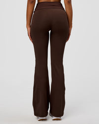 Model wearing CF Fold Over High-Rise Flared Legging - Hot Chocolate | Model:Jordan | Size:S