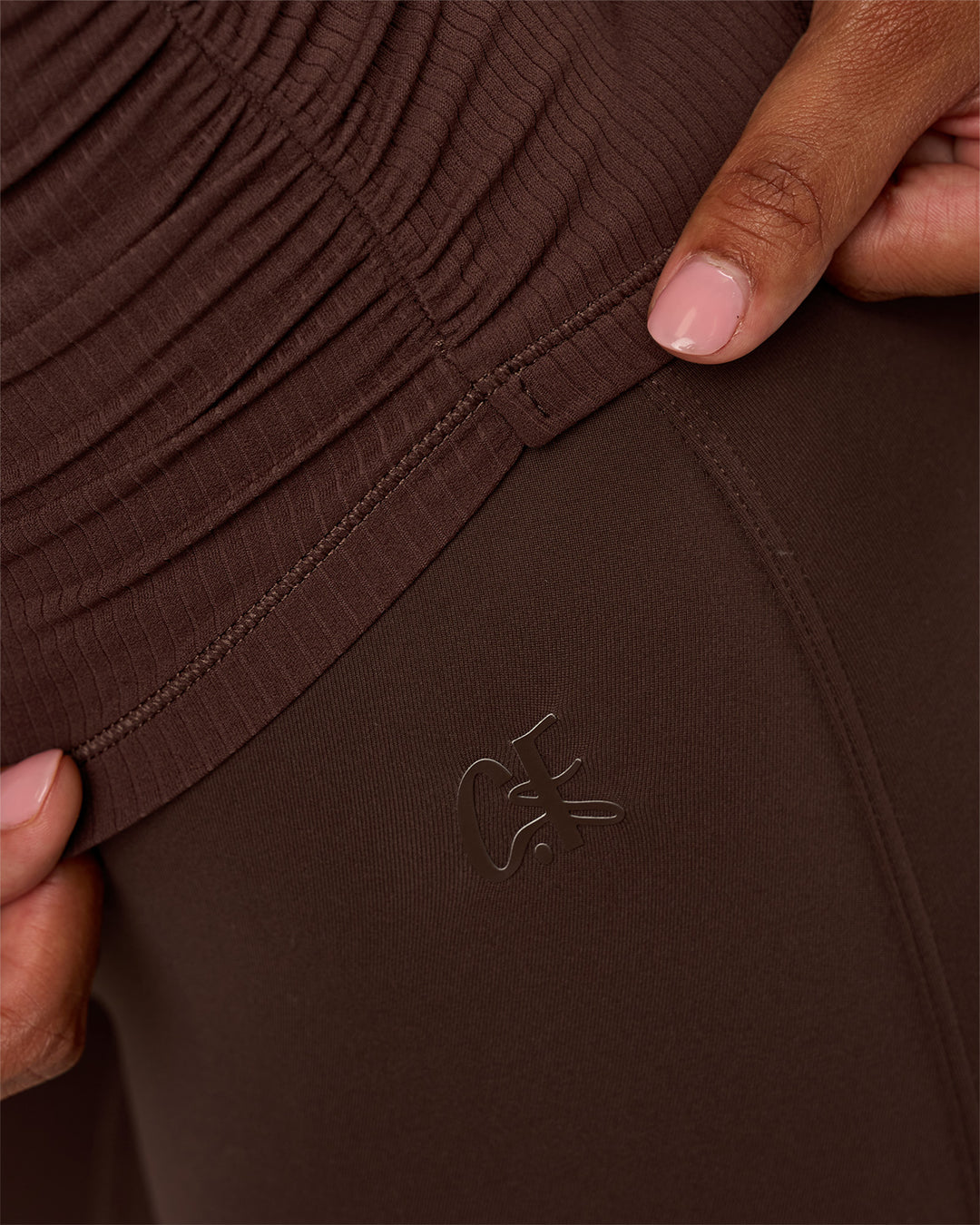 Model wearing CF Fold Over High-Rise Flared Legging - Hot Chocolate | Model:Jordan | Size:S