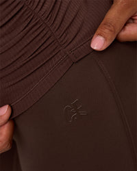 Model wearing CF Fold Over High-Rise Flared Legging - Hot Chocolate | Model:Jordan | Size:S