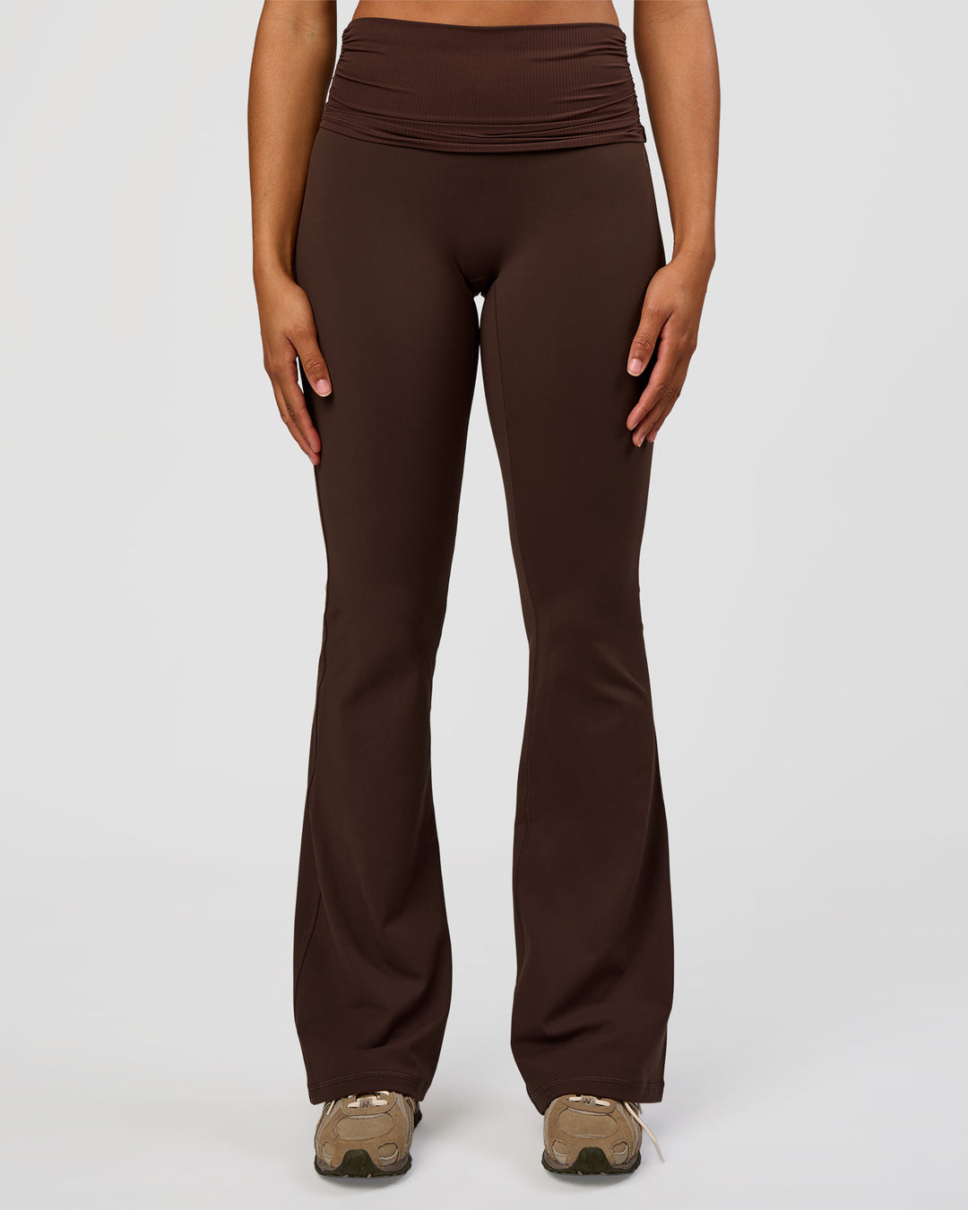 Woman wearing CF Fold Over High-Rise Flared Legging Tall - Hot Chocolate | Model:Rosie | Size:S