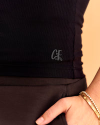Woman wearing CF Move Through It Rib Tank - Black | Model:Chloe | Size:S