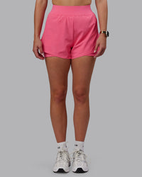 Woman wearing Challenger 3" Lined Performance Shorts in Pink Lemonade | Size:S