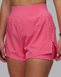 Woman wearing Challenger 3" Lined Performance Shorts in Pink Lemonade | Size:S