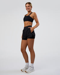 Woman wearing Challenger 3" Lined Performance Short - Black | Model:Amity | Size:S