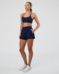 Woman wearing Challenger 3" Lined Performance Short - Future Navy | Model:Evie | Size:S | Thumbnail Index: 8