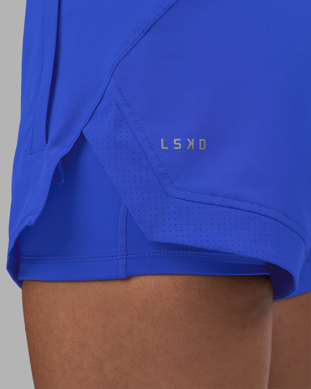 Woman wearing Challenger 3&quot; Lined Performance Short - Power Cobalt | Model:Rhiley | Size:S