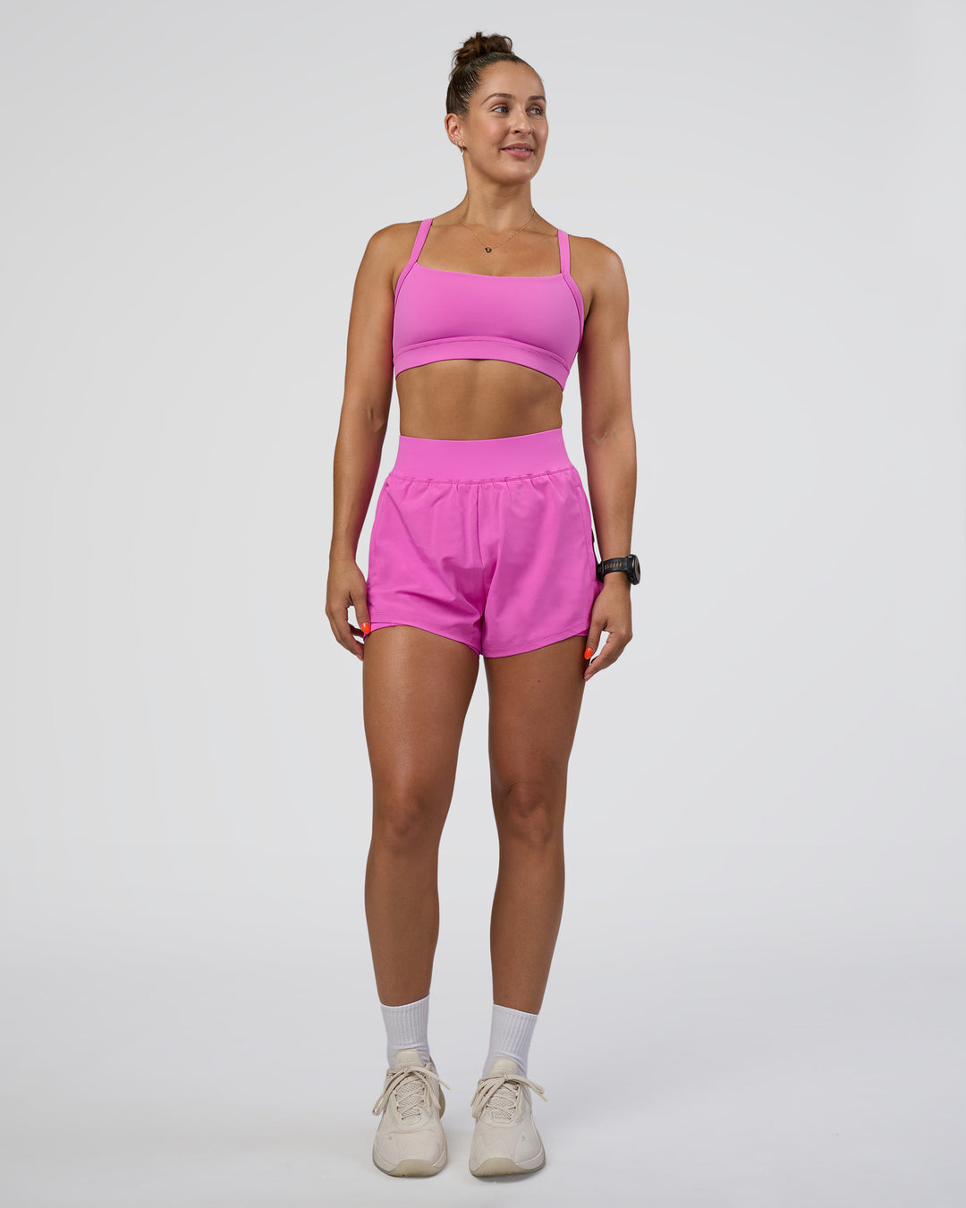 Woman wearing Challenger 3&quot; Lined Performance Short - Ultra Fuchsia | Model:Abbey | Size:S