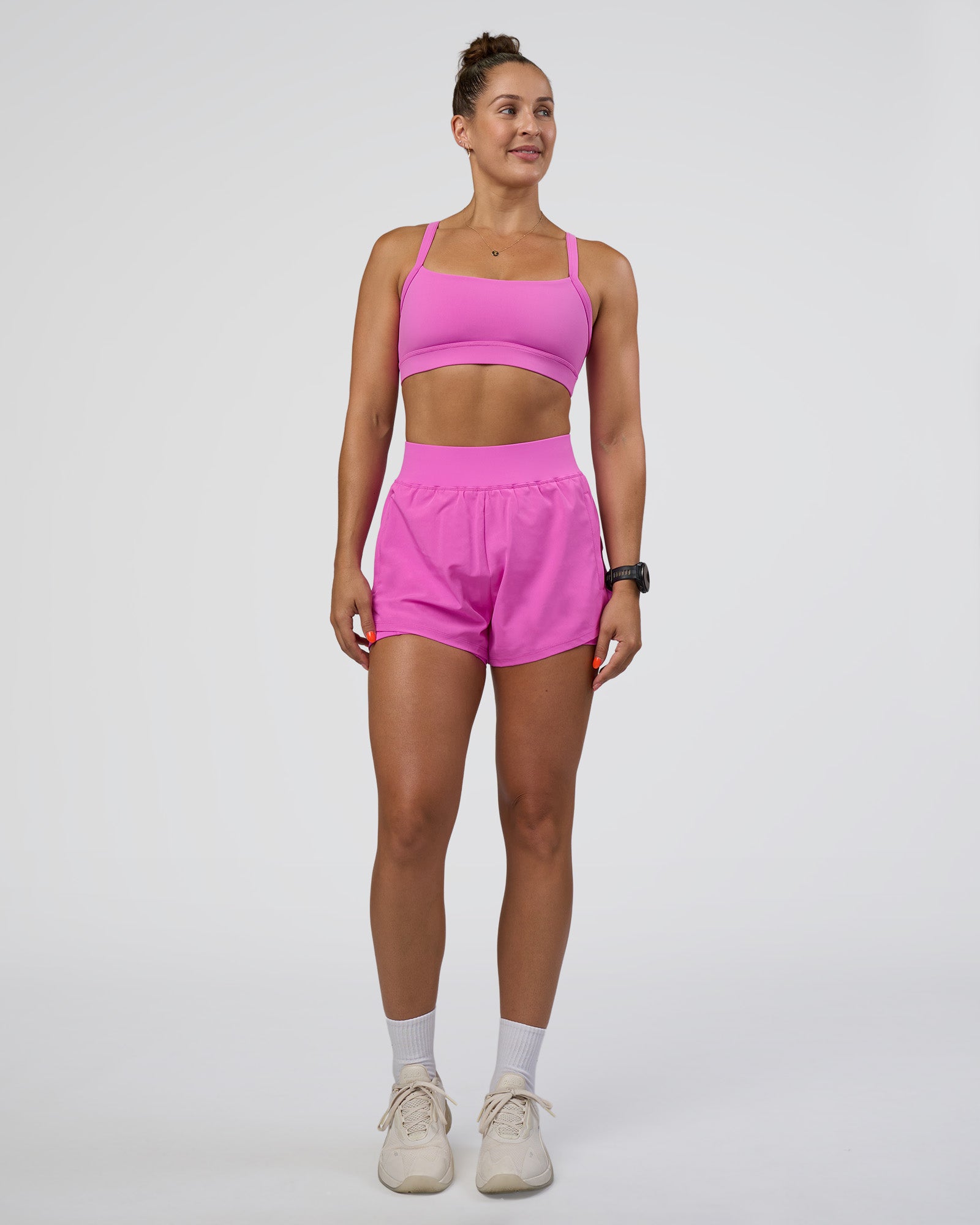 Woman wearing Challenger 3" Lined Performance Short - Ultra Fuchsia | Model:Abbey | Size:S