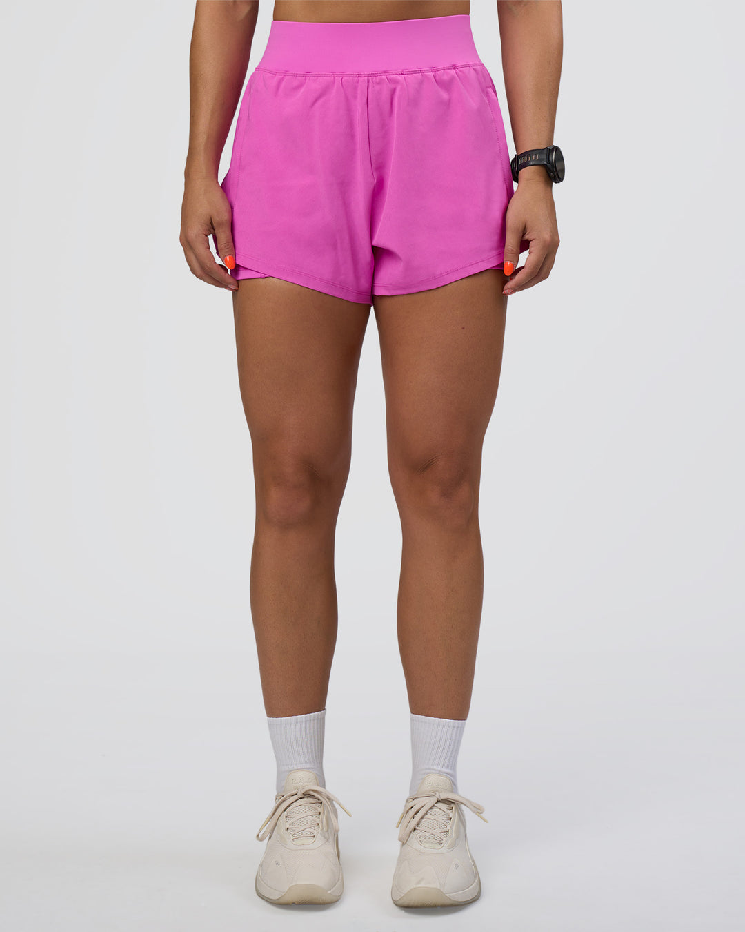 Woman wearing Challenger 3&quot; Lined Performance Short - Ultra Fuchsia | Model:Abbey | Size:S