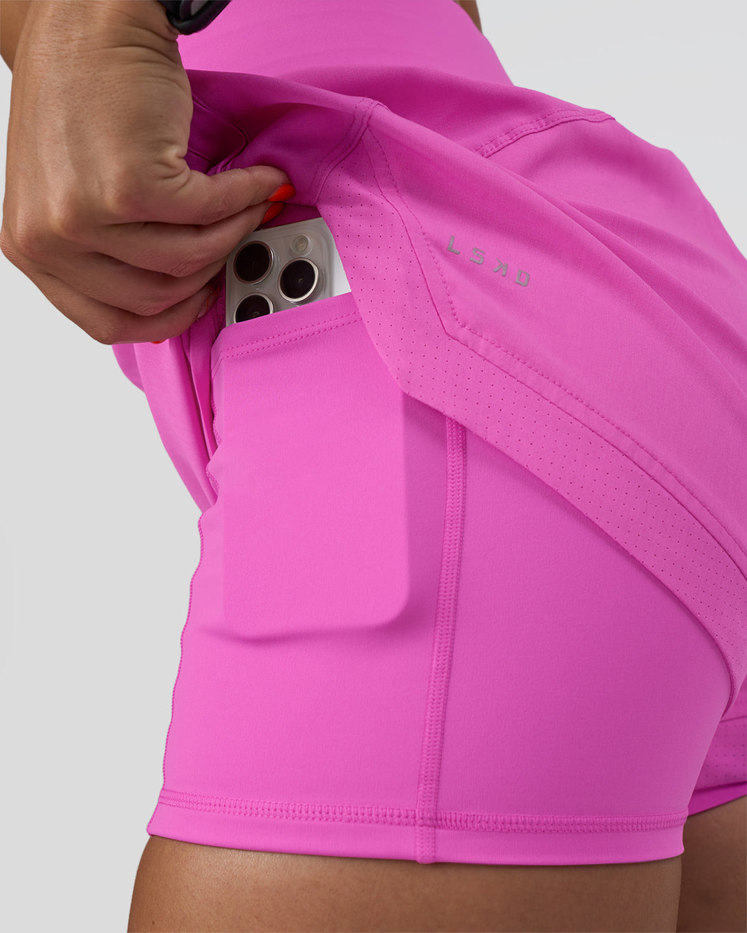 Woman wearing Challenger 3&quot; Lined Performance Short - Ultra Fuchsia | Model:Abbey | Size:S