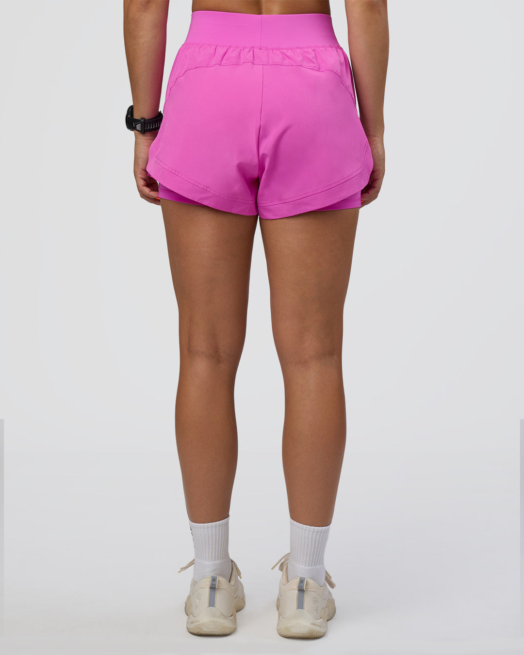 Woman wearing Challenger 3&quot; Lined Performance Short - Ultra Fuchsia | Model:Abbey | Size:S