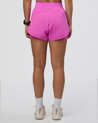 Woman wearing Challenger 3" Lined Performance Short - Ultra Fuchsia | Model:Abbey | Size:S