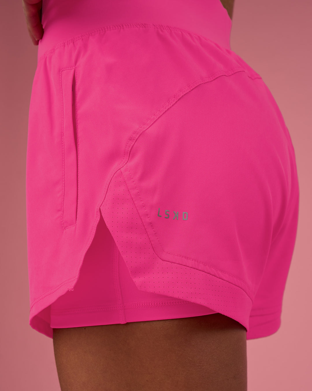 Woman wearing Challenger 3&quot; Lined Performance Short - Ultra Pink | Model:Hannah | Size:S