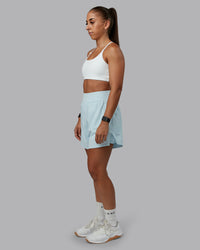 Woman wearing Challenger 5" Lined Performance Short in Skyride | Size:S | Model:Tylah