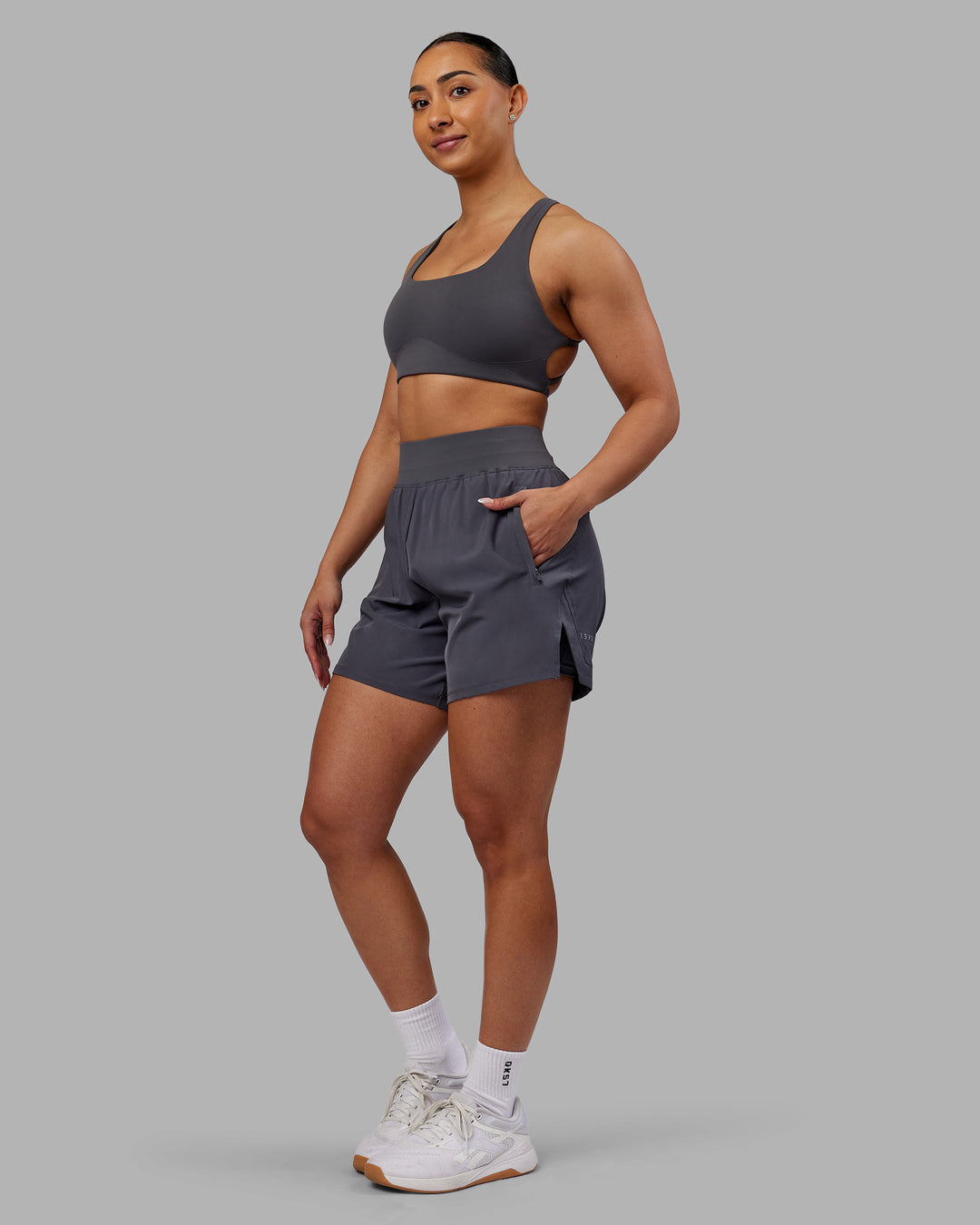 Woman wearing Challenger 5&quot; Lined Performance Short - Dark Storm | Model:Ayla | Size:S