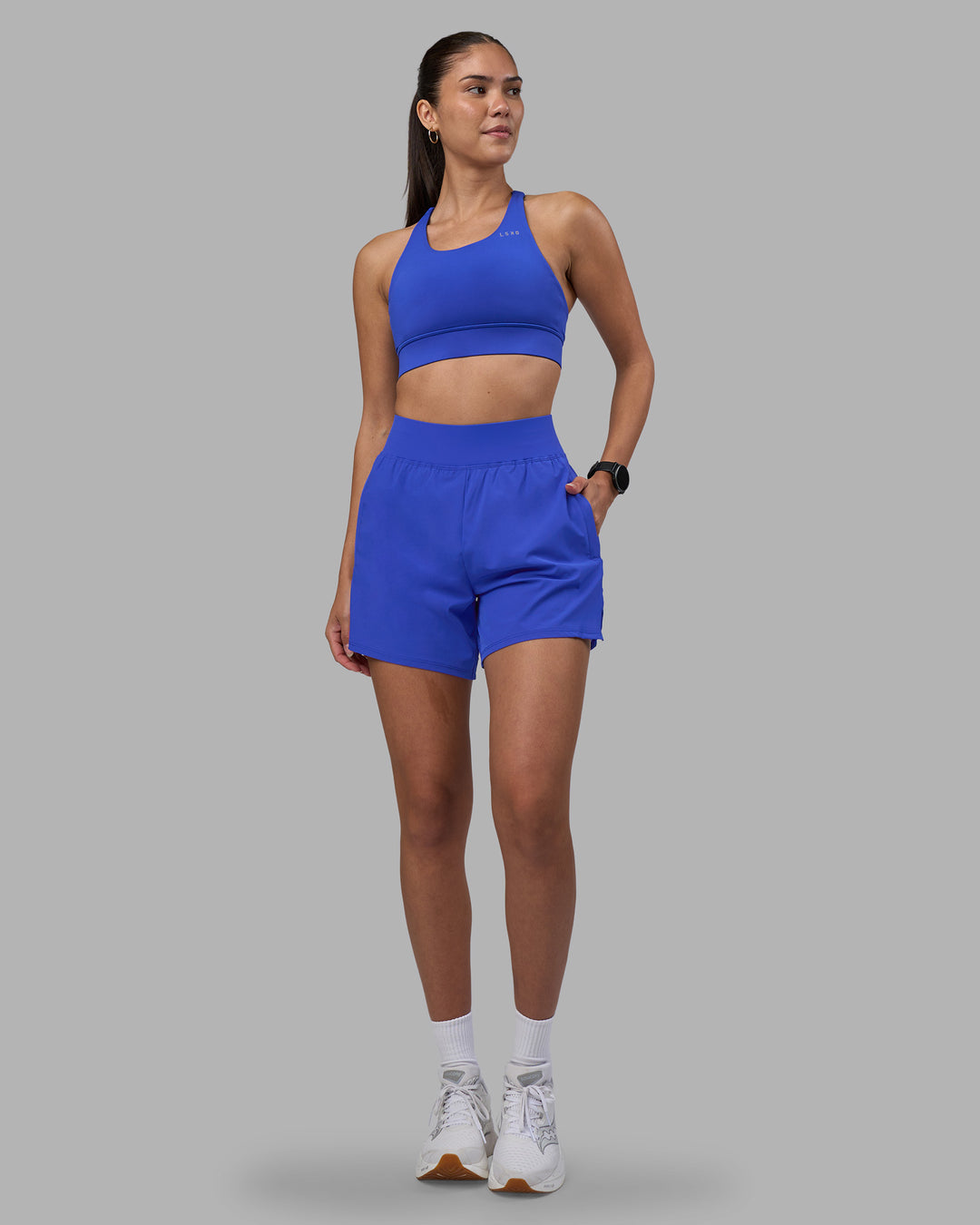 Woman wearing Challenger 5&quot; Lined Performance Short - Power Cobalt | Model:Rhiley | Size:S