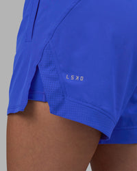 Woman wearing Challenger 5" Lined Performance Short - Power Cobalt | Model:Rhiley | Size:S