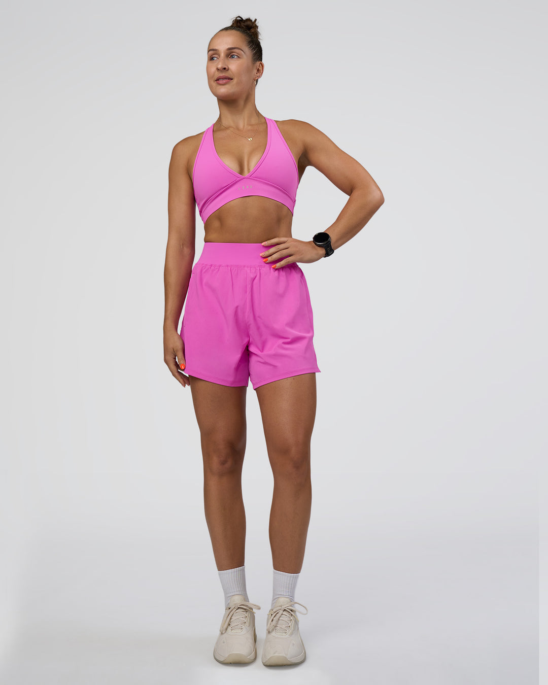 Woman wearing Challenger 5" Lined Performance Short - Ultra Fuchsia | Model:Abbey | Size:S