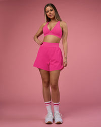 Woman wearing Challenger 5" Lined Performance Short - Ultra Pink | Model:Tianah | Size:S