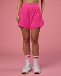 Woman wearing Challenger 5" Lined Performance Short - Ultra Pink | Model:Tianah | Size:S