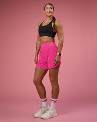 Woman wearing Challenger 5" Lined Performance Short - Ultra Pink | Model:Hannah  | Size:S