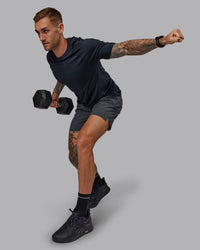 Man wearing Challenger 6" Performance Short in Dark Storm | Size:S