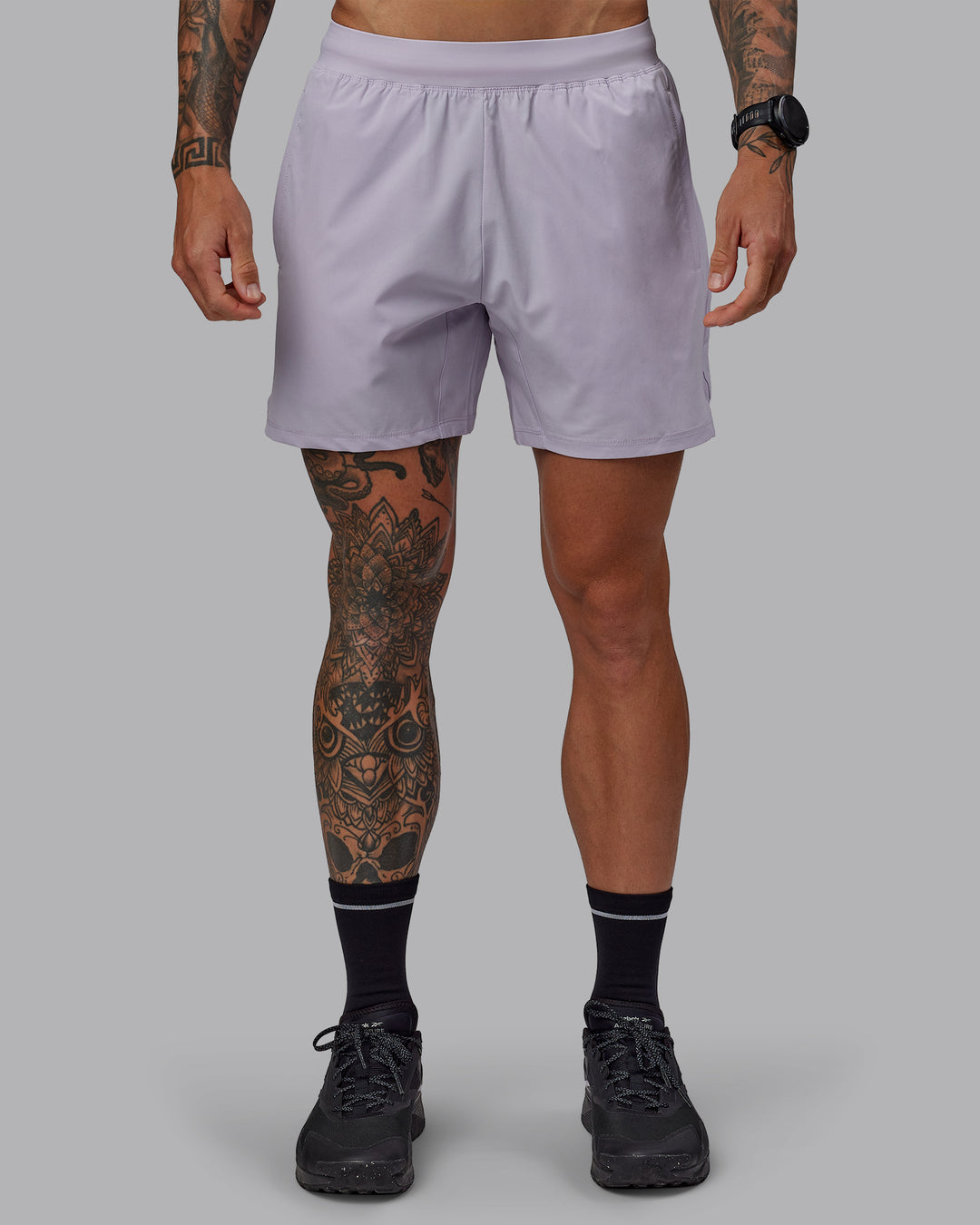 Man wearing Challenger 6&quot; Performance Short in Galactic Lilac | Size:S