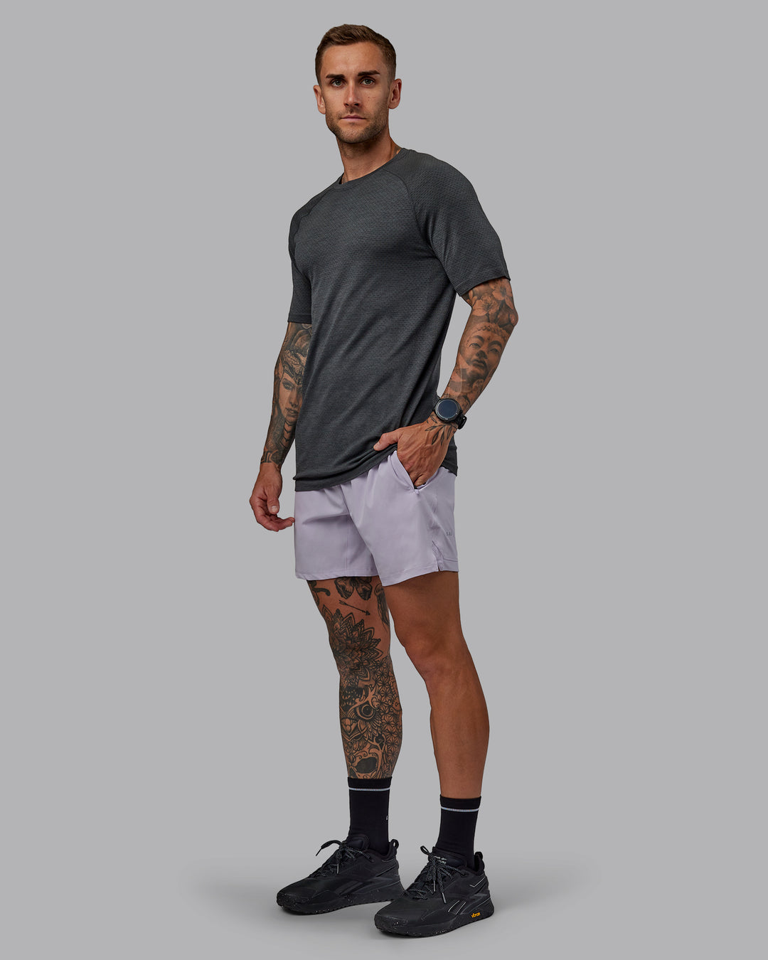 Man wearing Challenger 6&quot; Performance Short in Galactic Lilac | Size:S
