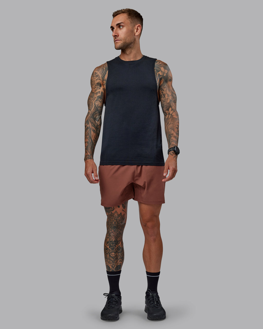 Man wearing Challenger 6&quot; Performance Short in Mahogany | Size:S