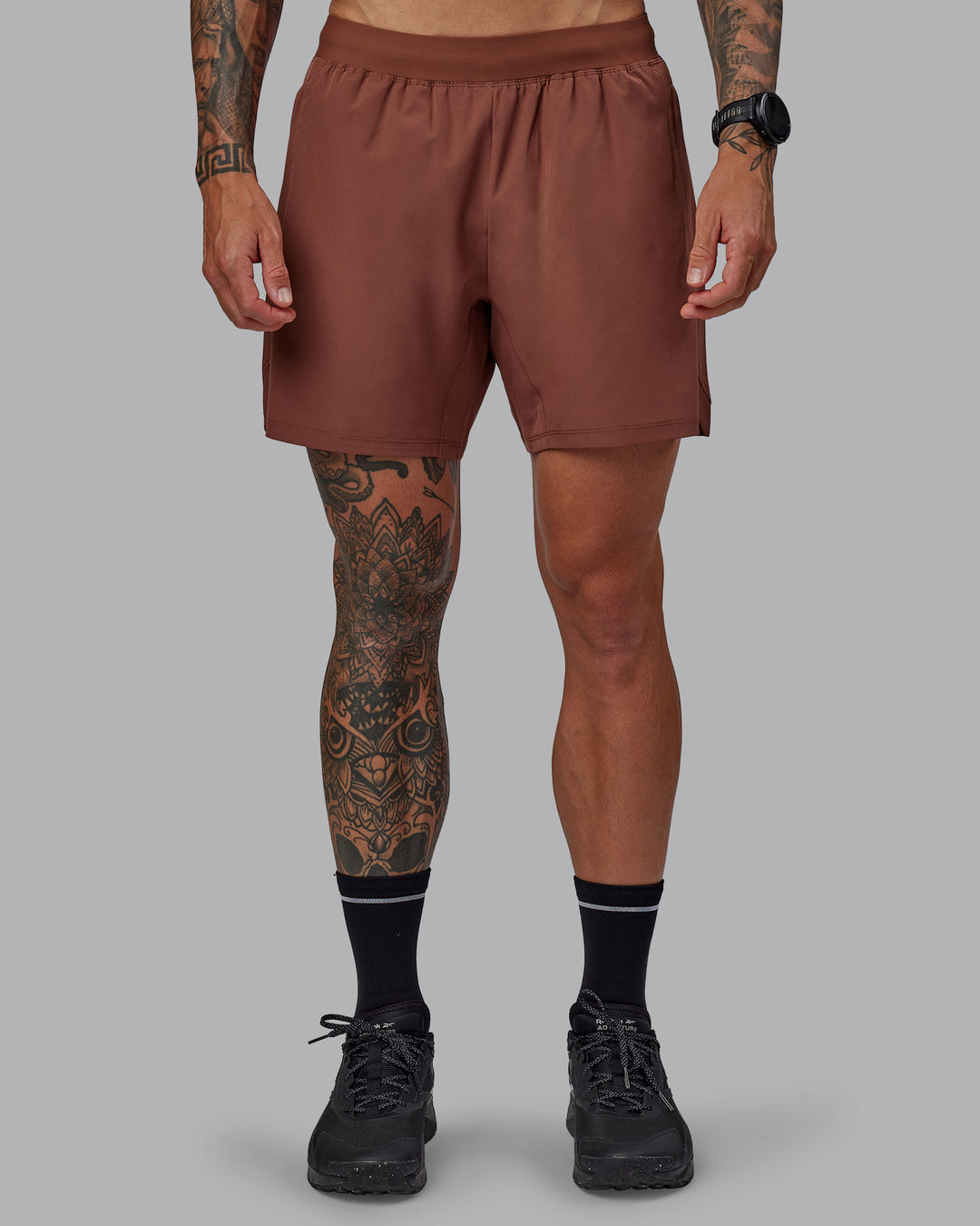 Man wearing Challenger 6&quot; Performance Short in Mahogany | Size:S