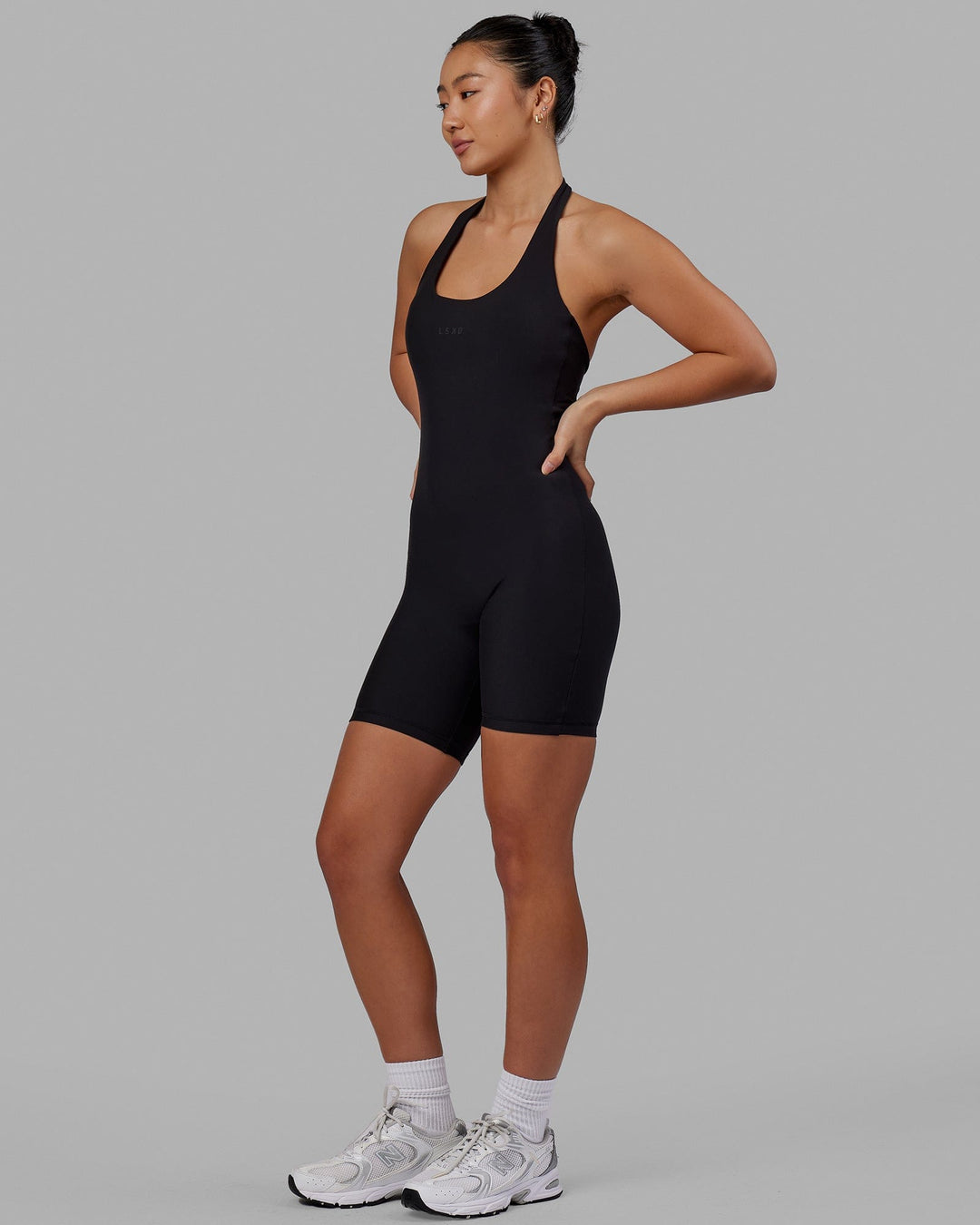 Woman wearing Challenger Bodysuit - Black