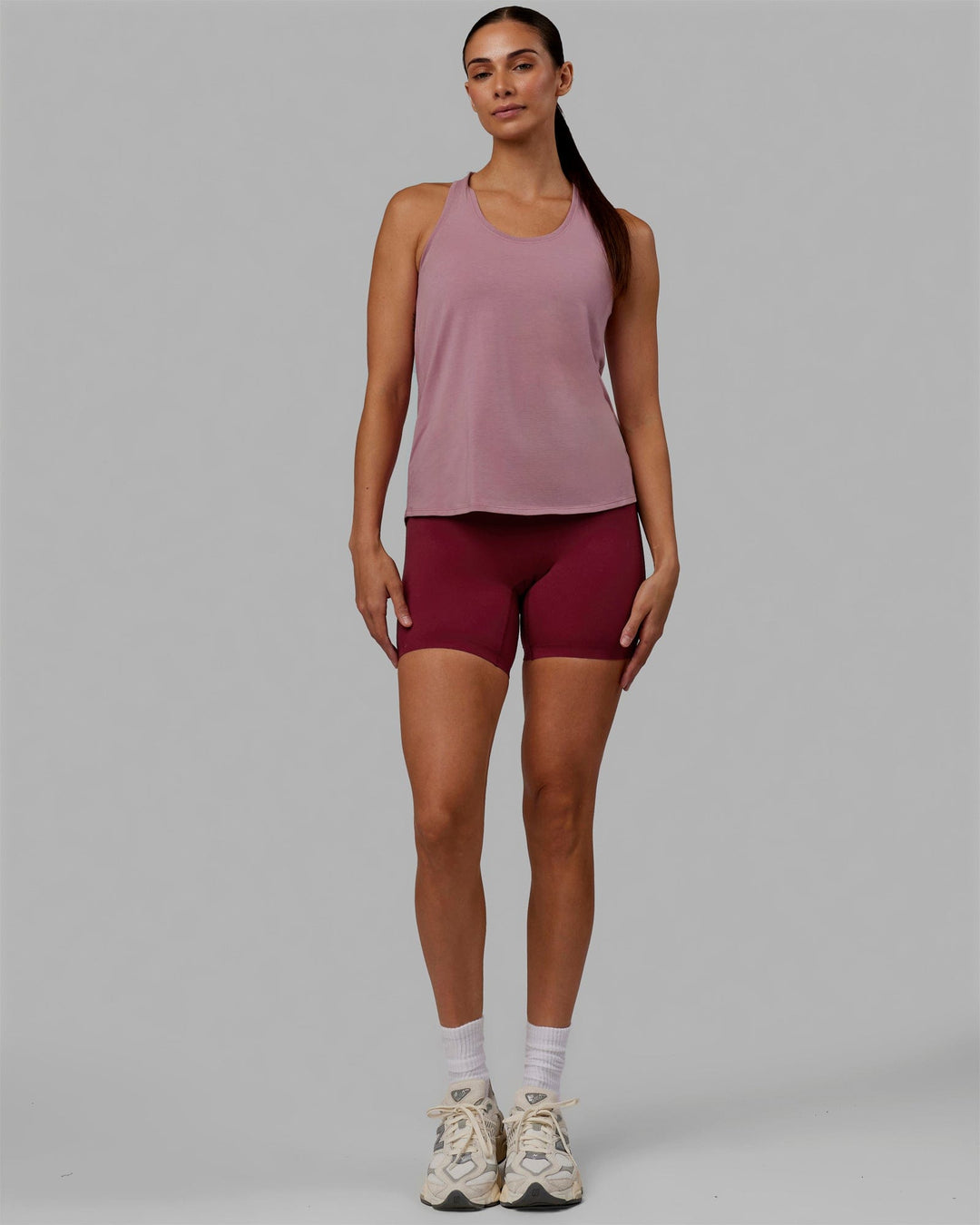 Woman wearing Charge PimaFLX-Lite Active Tank - Cosmetic Pink