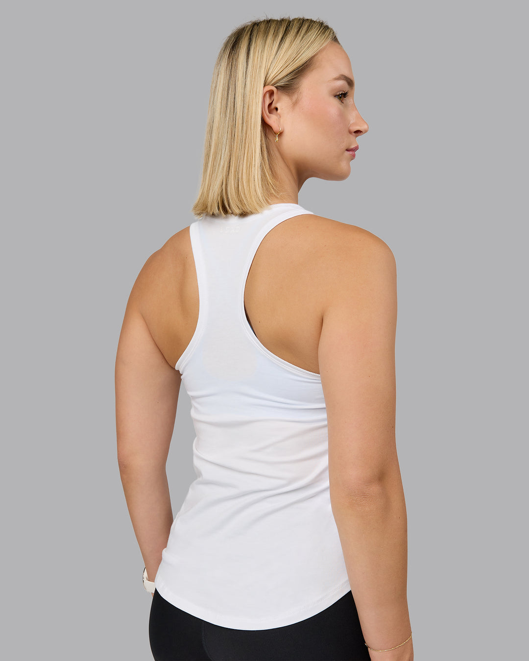 Woman wearing Charge PimaFLX-Lite Active Tank - White | Model:Halle | Size:S