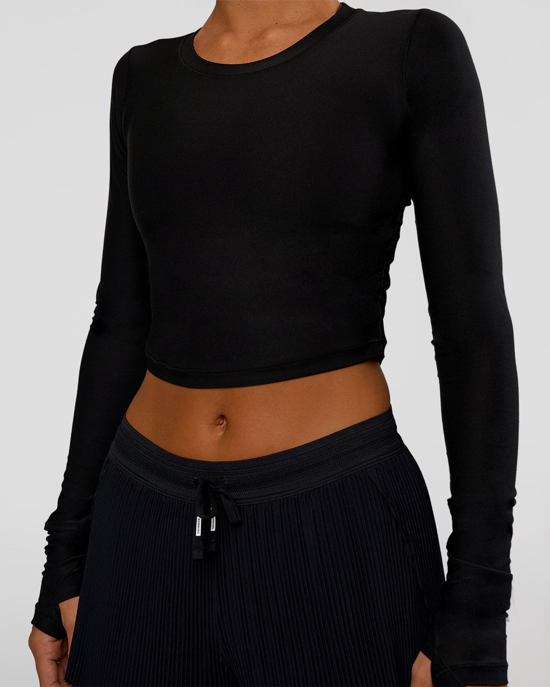 Woman wearing Clarity Long Sleeve Tee - Black | Model:Amity | Size:S