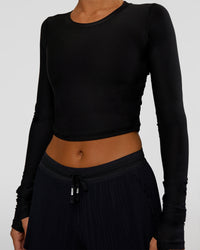 Woman wearing Clarity Long Sleeve Tee - Black | Model:Amity | Size:S