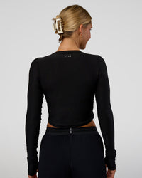 Woman wearing Clarity Long Sleeve Tee - Black | Model:Amity | Size:S