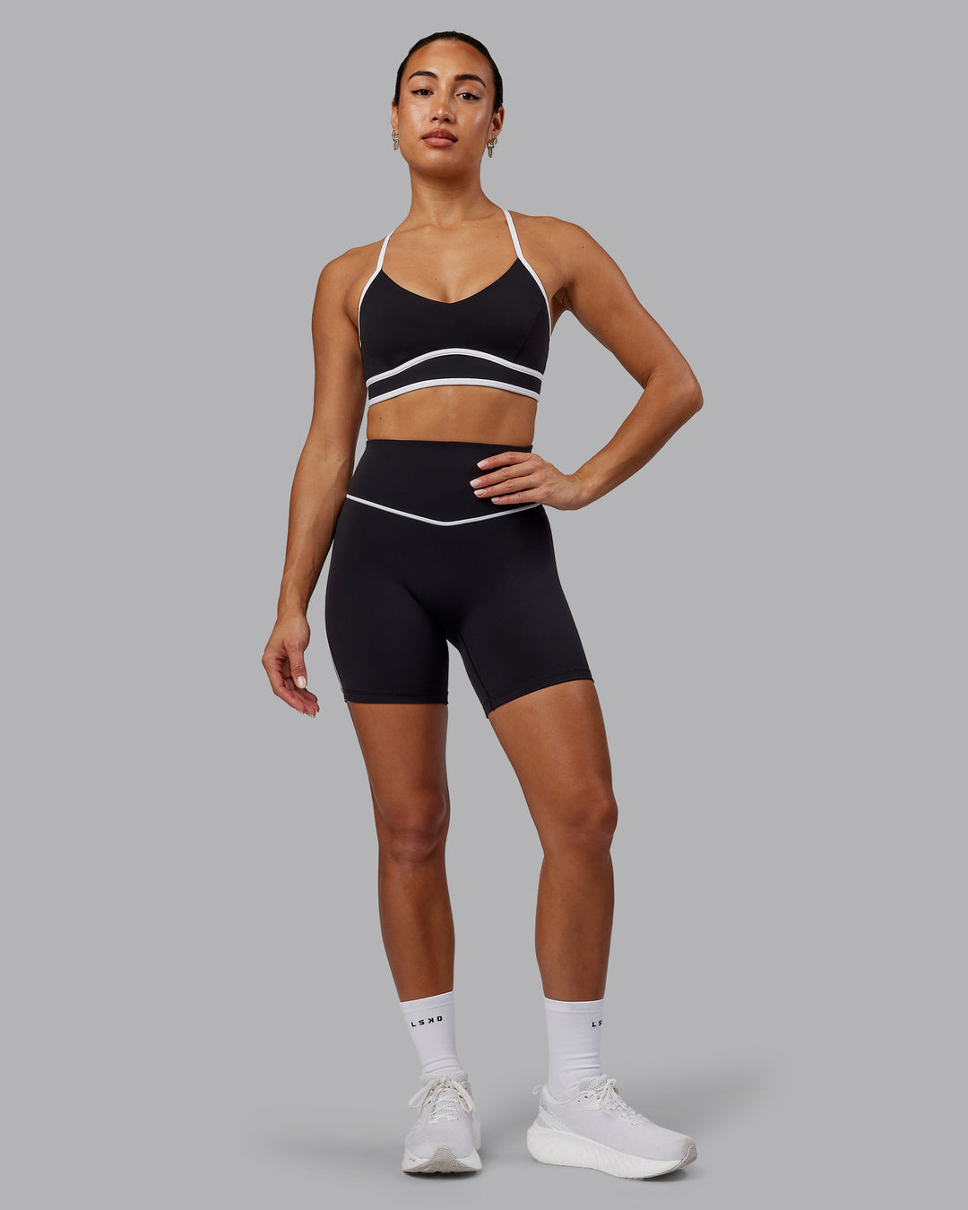 Woman wearing Contrast Ultra High-Rise 6&quot; Short - Black-White