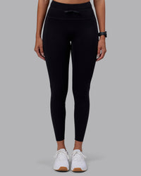 Woman wearing Effortless Drawstring Ultra High-Rise Full Length Legging Pockets - Black | Model:Rhiley | Size:S