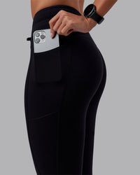 Woman wearing Effortless Drawstring Ultra High-Rise Full Length Legging Pockets - Black | Model:Rhiley | Size:S
