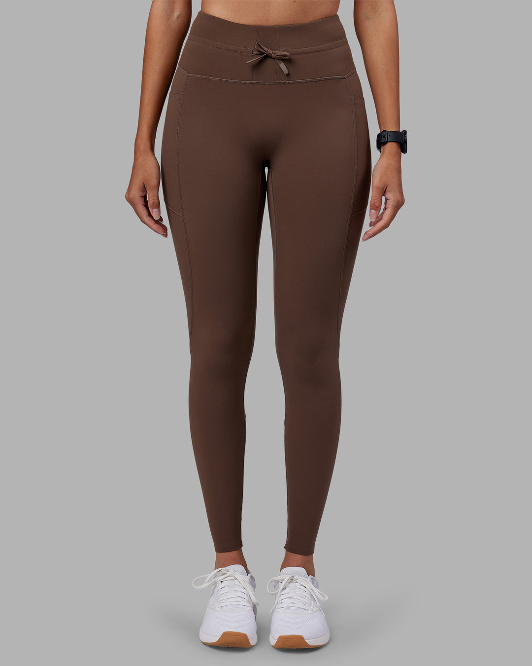 Woman wearing Effortless Drawstring Ultra High-Rise Full Length Legging Pockets - Chocolate Martini | Model:Rhiley | Size:S