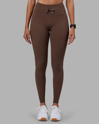 Woman wearing Effortless Drawstring Ultra High-Rise Full Length Legging Pockets - Chocolate Martini | Model:Rhiley | Size:S