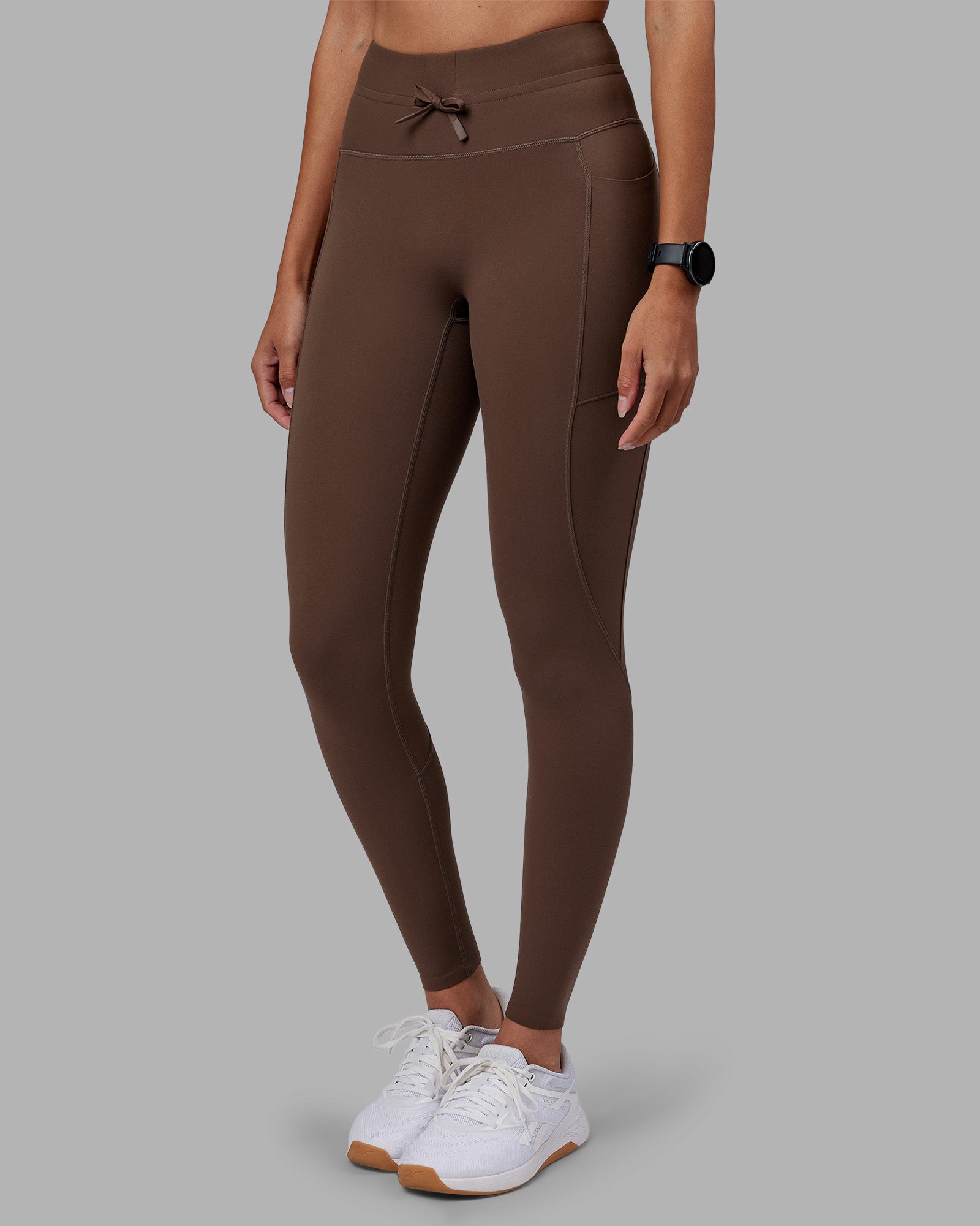 Woman wearing Effortless Drawstring Ultra High-Rise Full Length Legging Pockets - Chocolate Martini | Model:Rhiley | Size:S
